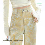 SHOPMOCHO Retro fashion yellow tie-dye printed dopamine jeans female summer new temperament high waist design loose Joker wide-leg pants.