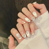 SHOPMOCHO 10pcs Purple Cat's Eye Handmade Fake Nails Tips Glitter Mid-length Oval Press on Nails Art Bow Rhinestone Design False Nail Sets