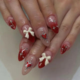 Shopmocho 24 PCs Valentine's Day Long Almond Shape Novelty Pearl Bow Love Nail with 1 File and 1 Jelly Glue