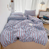 SHOPMOCHO Simple Red and Blue Striped Duvet Cover and Four Piece Bed Sheet Set with Washed Cotton Bedding on the Bed