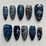 SHOPMOCHO 24Pcs Black Y2k Long False Nails with Almond Head Design Cat's Eye Silver Stripe Pattern Press on Fake Nails Wearable Nail Tips