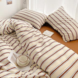 SHOPMOCHO Simple Red and Blue Striped Duvet Cover and Four Piece Bed Sheet Set with Washed Cotton Bedding on the Bed