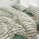 SHOPMOCHO Simple Red and Blue Striped Duvet Cover and Four Piece Bed Sheet Set with Washed Cotton Bedding on the Bed