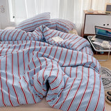 SHOPMOCHO Simple Red and Blue Striped Duvet Cover and Four Piece Bed Sheet Set with Washed Cotton Bedding on the Bed