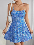 Shopmocho The cami dress with small flower prints a backless design and thin spaghetti straps is suitable for beach vacations and summer