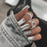 Shopmocho 24Pcs Long Coffin Leopard Print False Nails with Glue Sweet Cool Diamond Fake Nail Set Floral French Press on Wearable Nail Tips