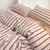 SHOPMOCHO Simple Red and Blue Striped Duvet Cover and Four Piece Bed Sheet Set with Washed Cotton Bedding on the Bed