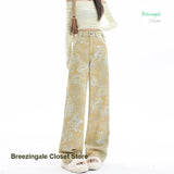 SHOPMOCHO Retro fashion yellow tie-dye printed dopamine jeans female summer new temperament high waist design loose Joker wide-leg pants.