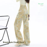SHOPMOCHO Retro fashion yellow tie-dye printed dopamine jeans female summer new temperament high waist design loose Joker wide-leg pants.