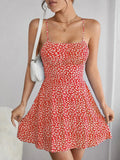 Shopmocho The cami dress with small flower prints a backless design and thin spaghetti straps is suitable for beach vacations and summer
